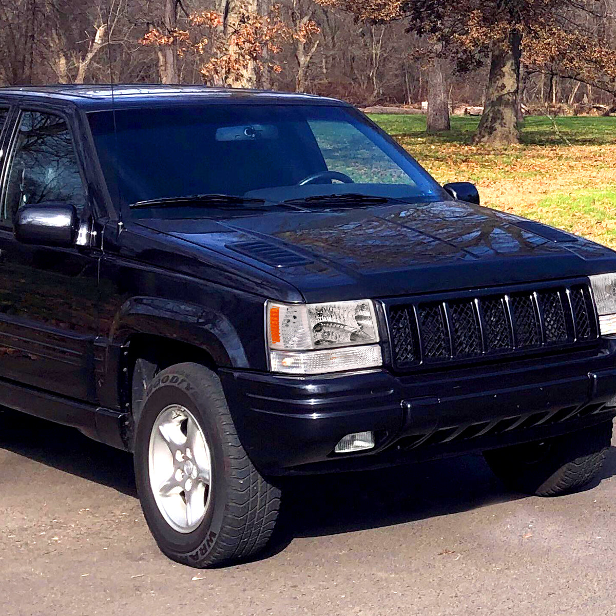 Ronnin - Faros de repuesto para Jeep Grand Cherokee 1993-1996 + Luces direccionales de parachoques + Luces de estacionamiento de esquina (par) | Cromado