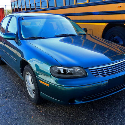Ronnin - Se adapta a Chevy Malibu 1997-2003, Chevy Classic 2004-2005, Oldsmobile Cutlass 1997-1999, conjunto de faros de repuesto con reflector transparente, par | Negro