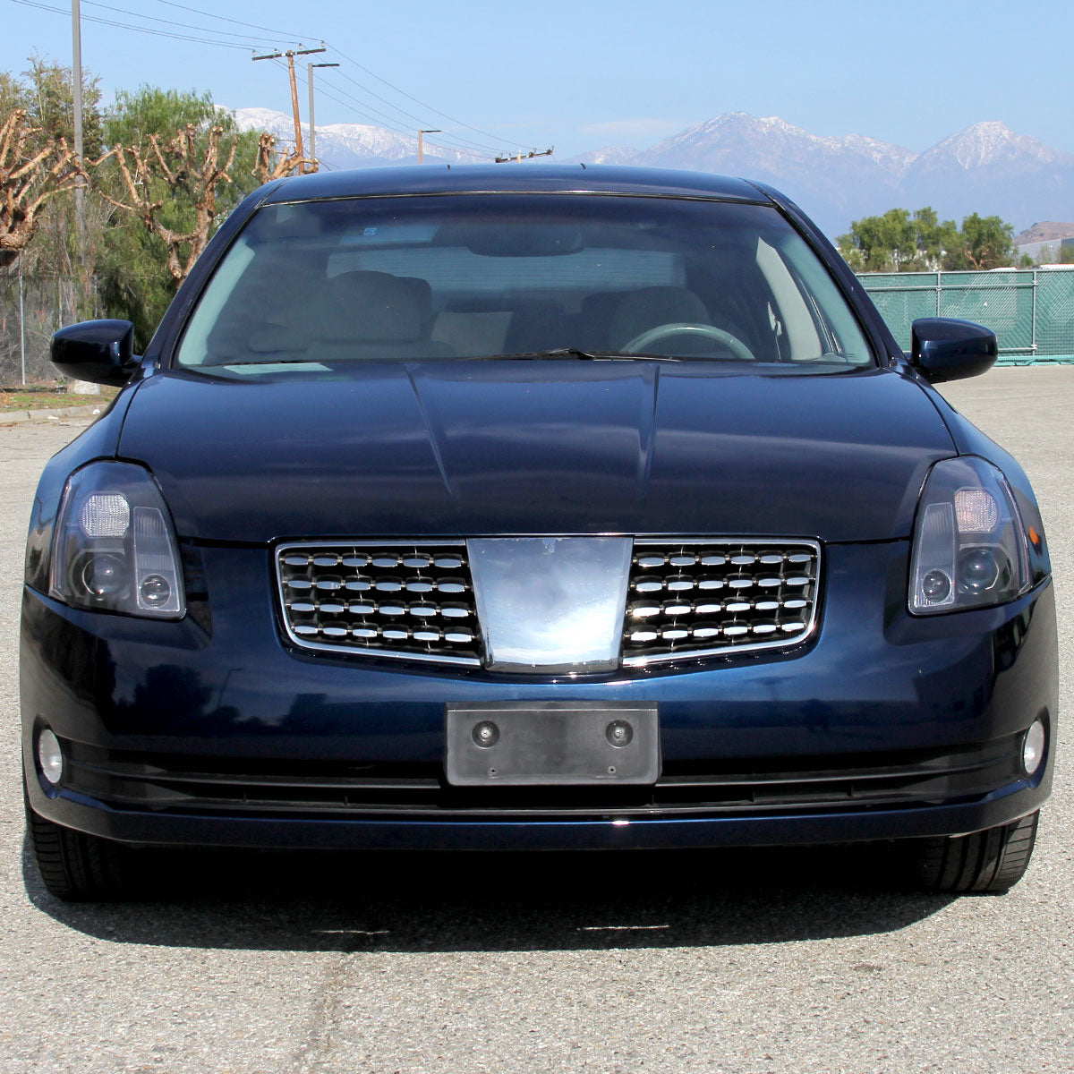 Ronnin - Se adapta a Nissan Maxima 2004-2006 Par de faros delanteros halógenos con proyector | Negros