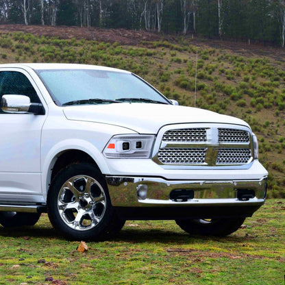 Ronnin - Fits 2009-2018 Ram 1500 2500 3500 2019-2024 Ram 1500 Classic Halogen Dual Projector Headlights  LED Switchback Sequential Signal + Animated Startup Effect Parking Assembly Pair | White