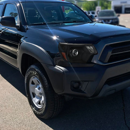 Ronnin - Conjunto de repuesto de faros delanteros con proyector halógeno para Toyota Tacoma 2012-2015, par | Negro
