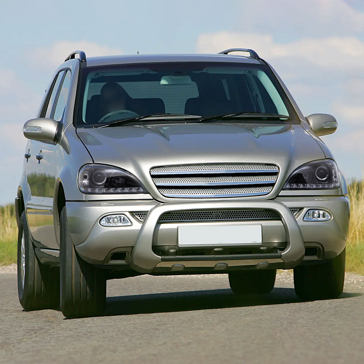 Ronnin - Se adapta a Mercedes-Benz ML320 ML430 de especificaciones estadounidenses de 1998-2001, par de faros delanteros con proyector halógeno y luces LED de circulación diurna de repuesto mejoradas | Negro ahumado