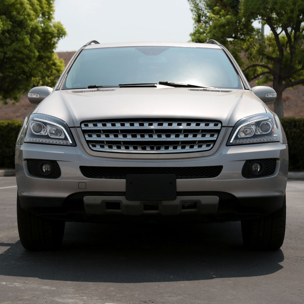 Ronnin - Se adapta a Mercedes-Benz ML350 ML500 ML320 con especificaciones estadounidenses de 2006-2008, conjunto de faros delanteros con proyector halógeno y señales de giro LED secuenciales | Par Negro