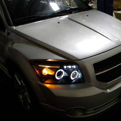 Ronnin - Compatible con Dodge Caliber 2007-2012 Faros Proyectores LED Mejorados de Doble Aro con Luces Diurnas, Par | Negro
