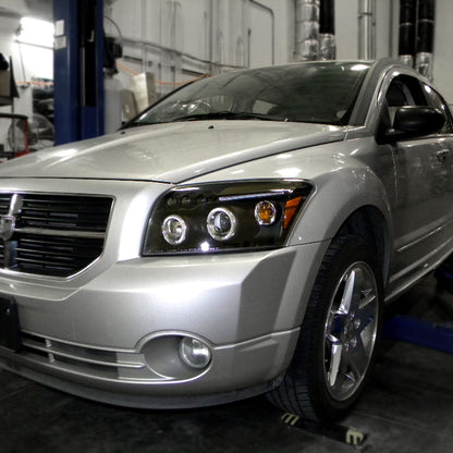 Ronnin - Compatible con Dodge Caliber 2007-2012 Faros Proyectores LED Mejorados de Doble Aro con Luces Diurnas, Par | Negro