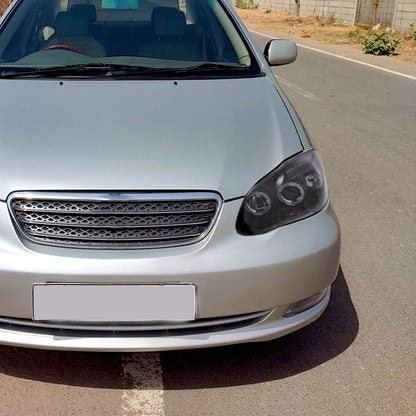 Ronnin - Fits 2003-2008 Toyota Corolla Upgraded Replacement  LED Dual Rims Projector Headlights Assembly Pair | Black Smoke