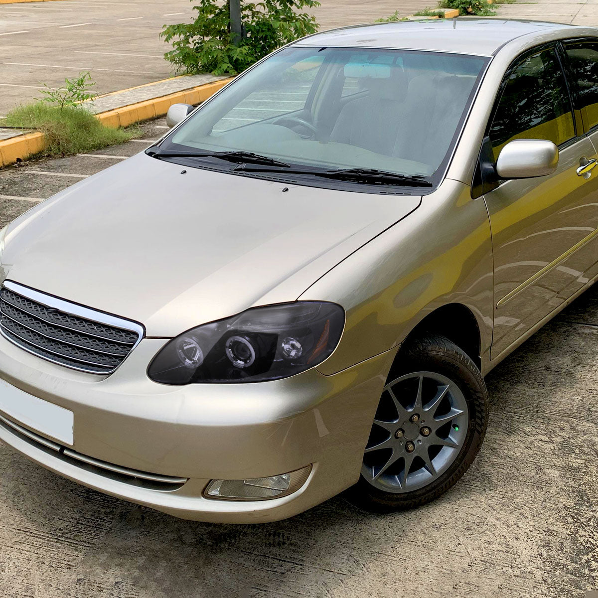 Ronnin - Fits 2003-2008 Toyota Corolla Upgraded Replacement  LED Dual Rims Projector Headlights Assembly Pair | Black Smoke