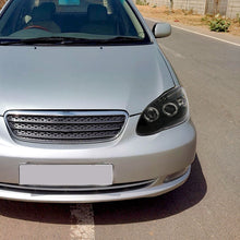 Ronnin - Se adapta a Toyota Corolla 2003-2008 Par de conjunto de faros delanteros con proyectores LED y doble aro mejorados | Negro