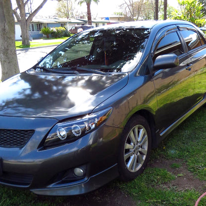 Ronnin - Se adapta a Toyota Corolla 2009-2010 Par de faros delanteros con proyector LED de doble aro y repuesto mejorado | Negro