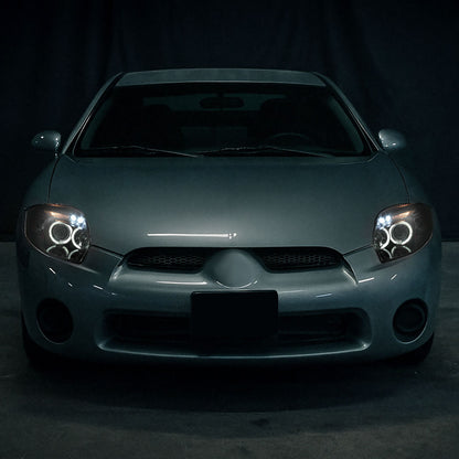Ronnin - Se adapta a Mitsubishi Eclipse 2006-2012, par de conjuntos de faros delanteros tipo proyector con LED de doble halo mejorados | Negro brillante