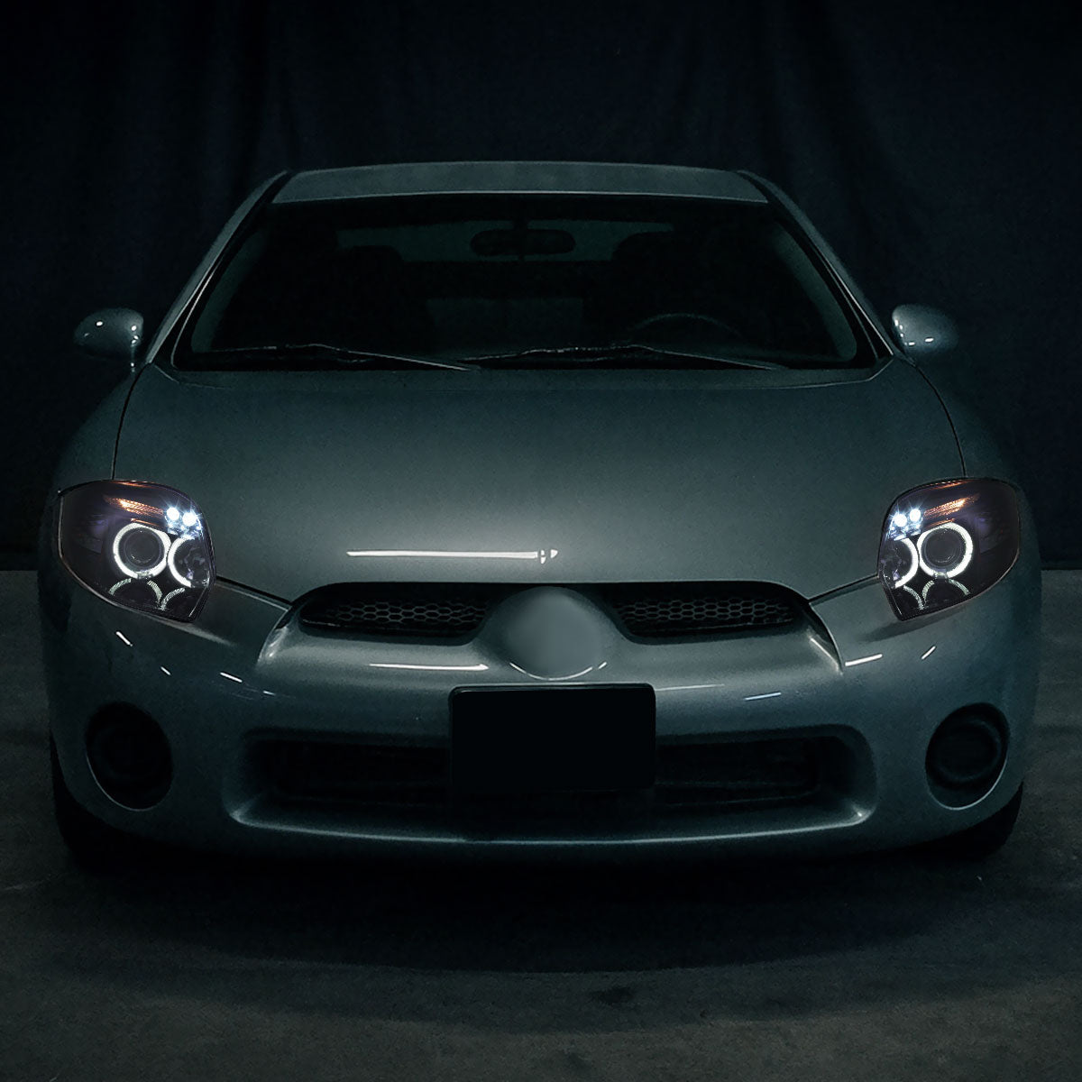 Ronnin - Compatible con Mitsubishi Eclipse 2006-2012, par de faros delanteros con proyector LED de doble aro mejorados | Negro humo