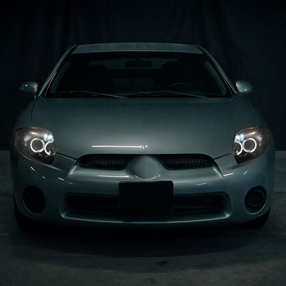 Ronnin - Compatible con Mitsubishi Eclipse 2006-2012, par de faros delanteros con proyector LED de doble aro mejorados | Negro