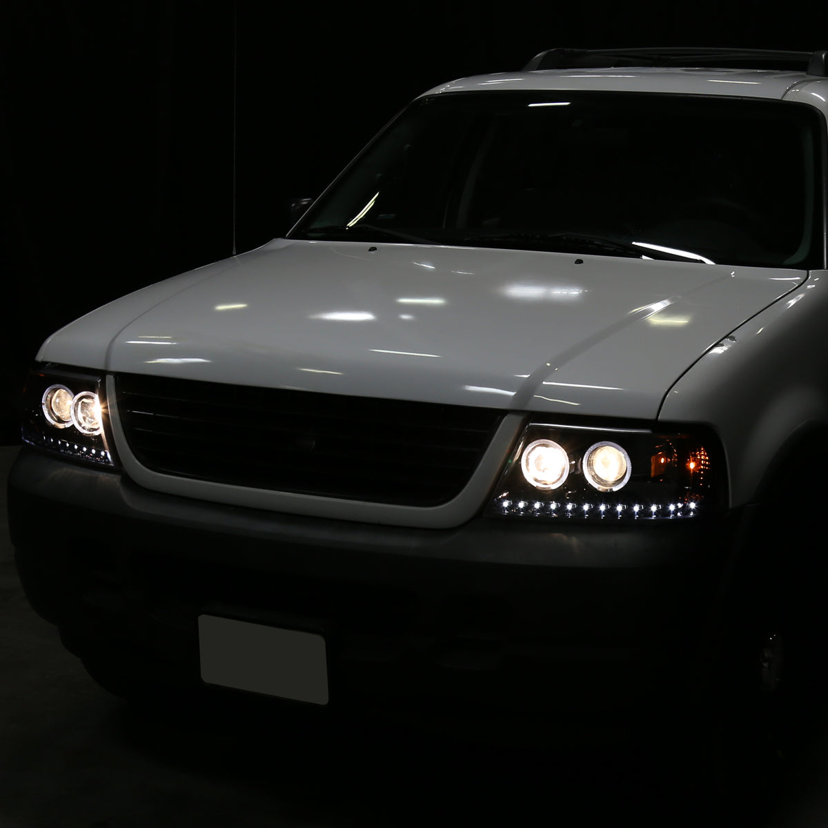 Ronnin - Faros delanteros con proyector LED de doble aro de repuesto y mejora para Ford Explorer 2002-2005 | Par de montaje negro brillante