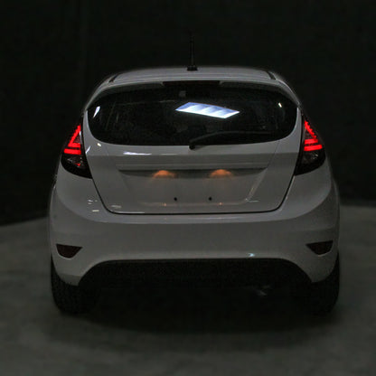 Ronnin - Se adapta a la Ford Fiesta 2011-2013 Hatchback US Spec Luces traseras LED completas Ensamblaje de reemplazo mejorado Par | Rojo Ahumado